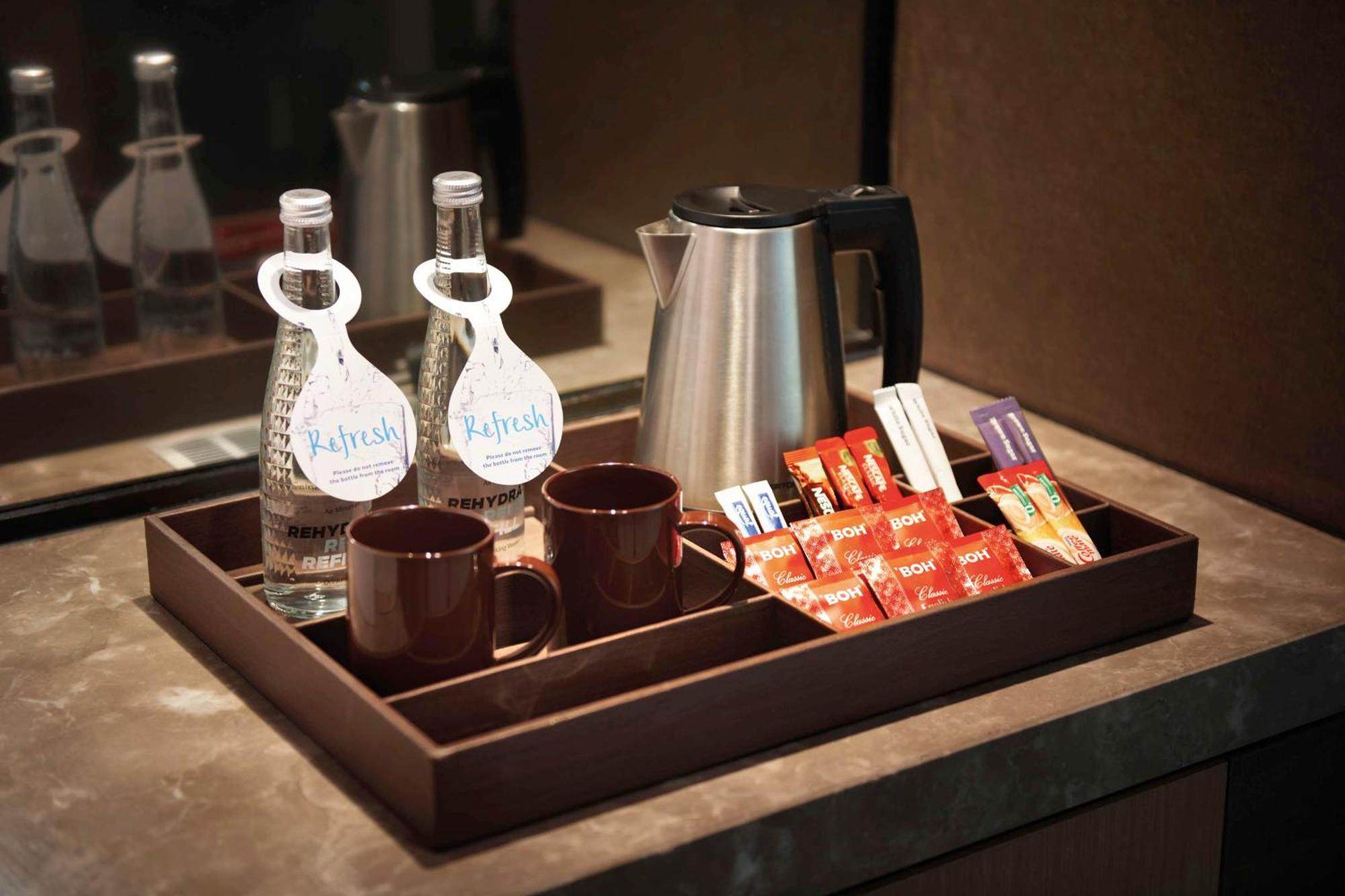 Doubletree By Hilton Melaka Hotel Exterior photo A hospitality tray